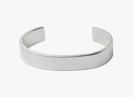 13MM FLAT CUFF BRACELET 201: this dense, solid cuff is hand forged in our lower east side studio using reclaimed sterling silver and then oxidized, creating a darkened finish that will wear over time to a lighter, contrasting patina