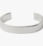 13MM FLAT CUFF BRACELET 201: this dense, solid cuff is hand forged in our lower east side studio using reclaimed sterling silver and then oxidized, creating a darkened finish that will wear over time to a lighter, contrasting patina