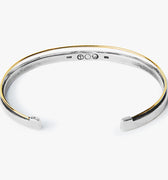 MIXED METAL STERLING SILVER/ 18K YELLOW GOLD CUFF BRACELET 207: this dual bracelet features an 18k gold wire that sits along a sterling cuff
