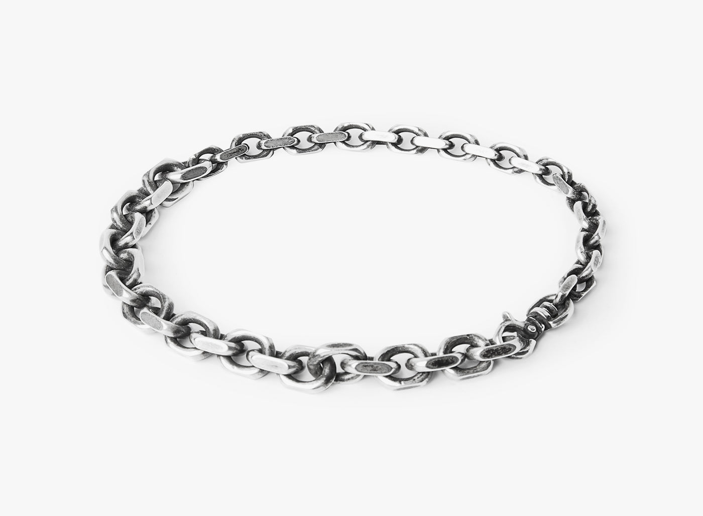 MIXED CHAIN BRACELET 212: a large cable chain connects to a small cable chain, fastened by a carabiner lobster clasp.