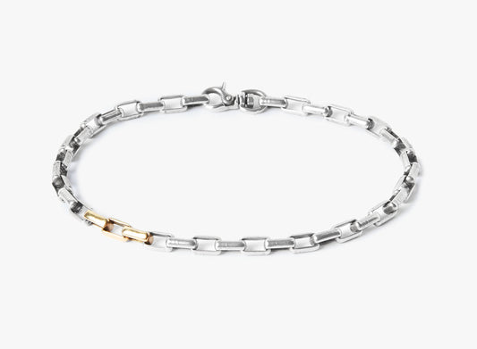 MIXED METAL STERLING SILVER/ 18K YELLOW GOLD BRACELET 215: this adjustable sterling box chain is complemented by 3-18k gold links