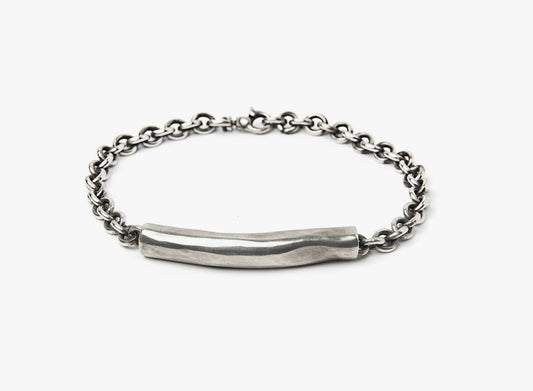 MIXED CHAIN BRACELET 277: this asymmetrical, tube wire connects to a round cable fastened by a lobster clasp. 