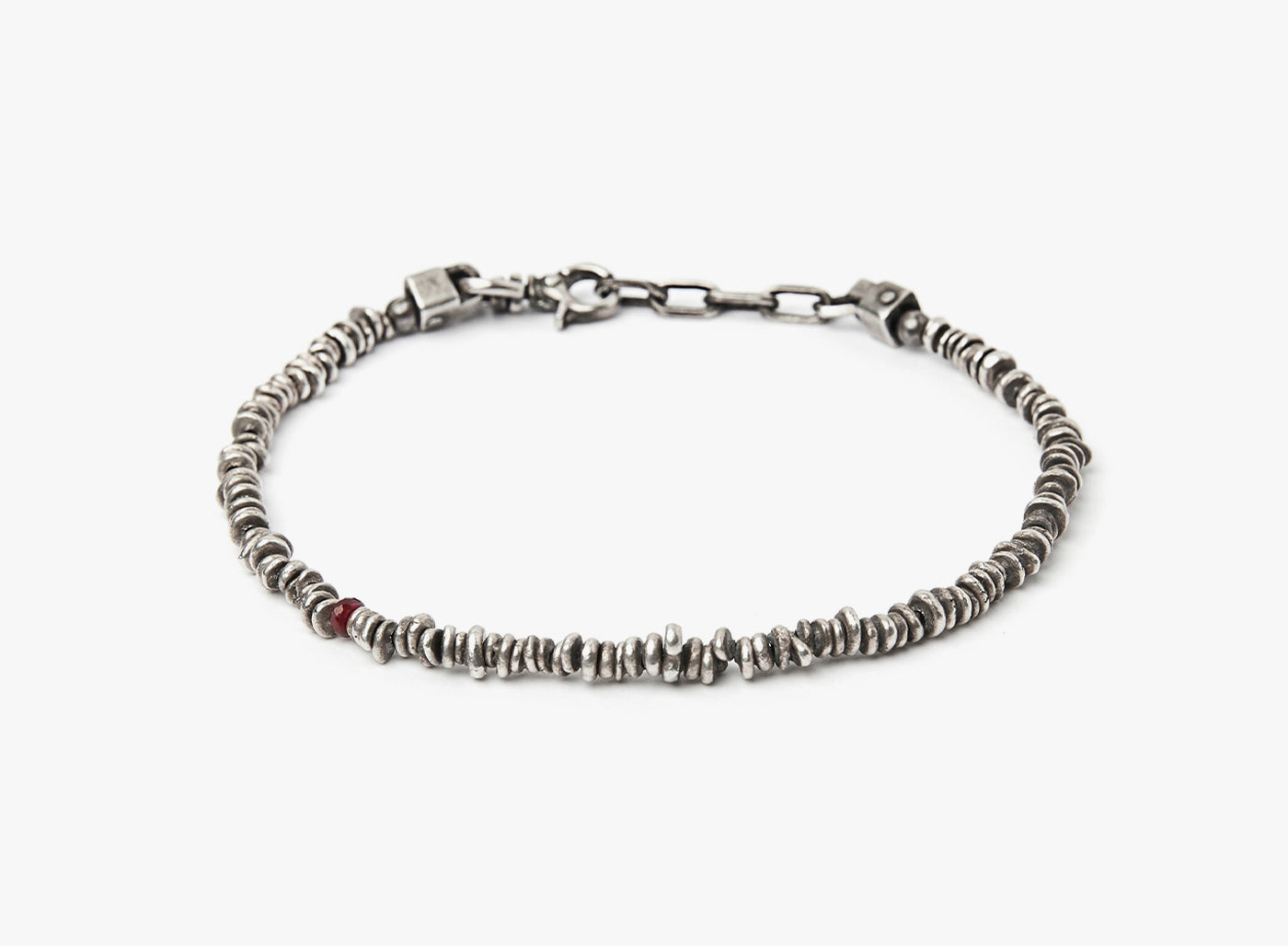 BEADED STONES SILVER CHIP BRACELET 281: this adjustable bracelet features organic sterling chip beads and is finished with a single ruby