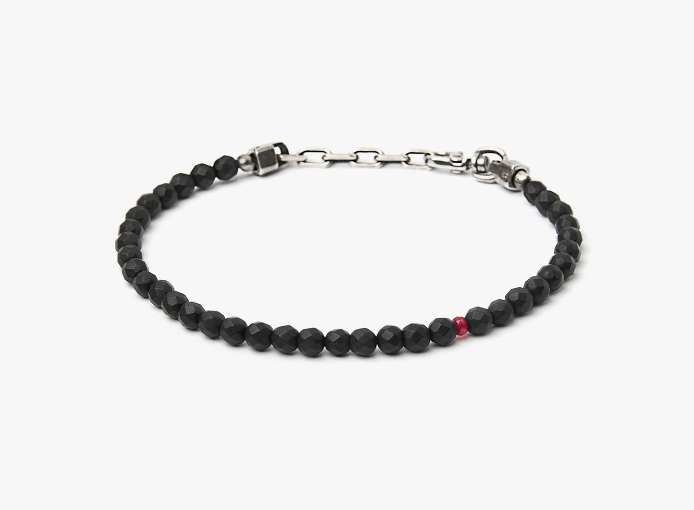 BEADED STONES BRACELET 287: this adjustable faceted onyx stone bracelet is accented by a single ruby and sterling box links.