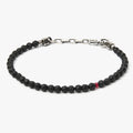 BEADED STONES BRACELET 287: this adjustable faceted onyx stone bracelet is accented by a single ruby and sterling box links.