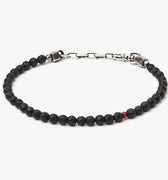 BEADED STONES BRACELET 287: this adjustable faceted onyx stone bracelet is accented by a single ruby and sterling box links.