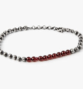 BEADED STONES BRACELET 305: this solid sterling ball chain consists of 3mm garnet beads and a single ruby are all finished with a lobster carabiner clasp. 