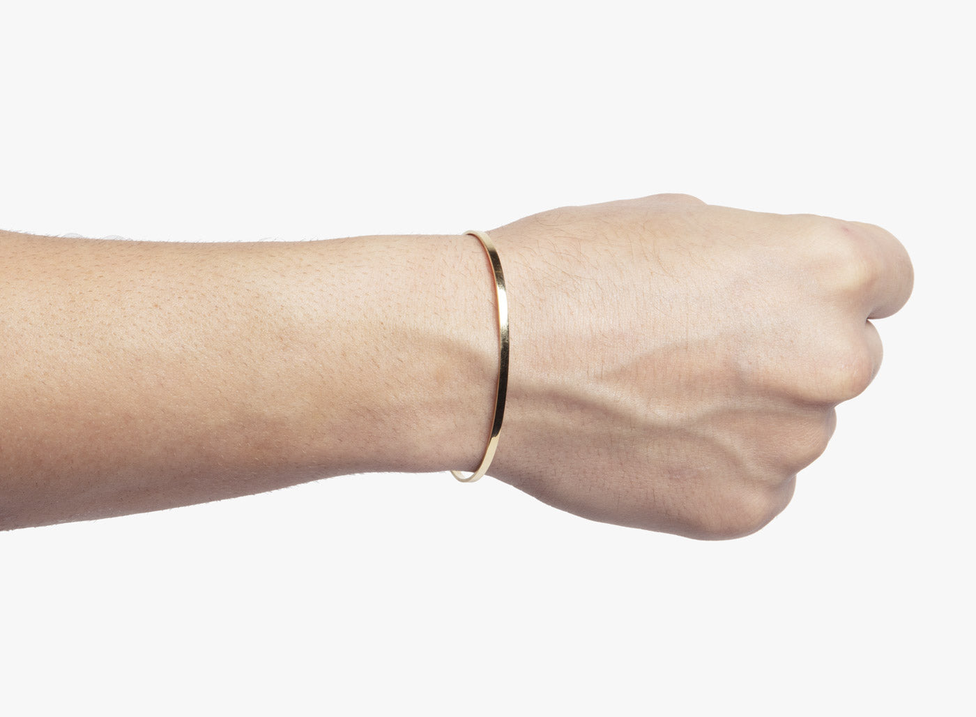18K SOLID BRACELET 342: this flat gold cuff is hand forged in our our lower east side studio using reclaimed 18k gold