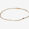 18K SOLID BAR W/ RUBY BRACELET 357: an 18k gold bar connects to a single red ruby and an 18k gold ball chain