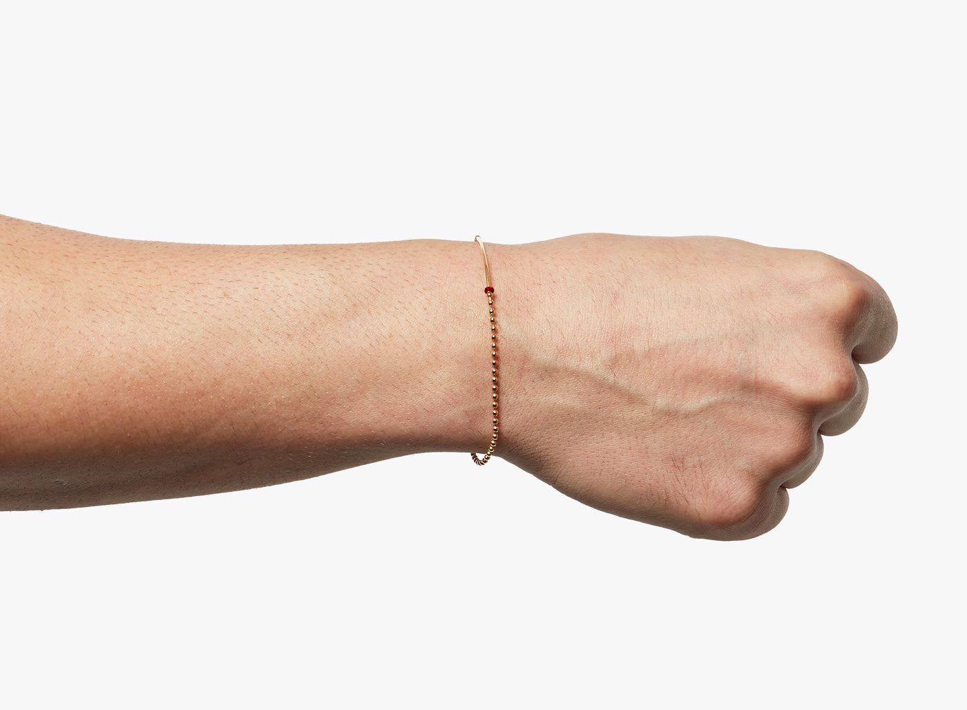 18K SOLID BAR W/ RUBY BRACELET 357: an 18k gold bar connects to a single red ruby and an 18k gold ball chain