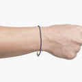 BEADED STONES LAPIS BRACELET 370: this 18k gold adjustable lapis stone bracelet is finished with a signature single ruby.