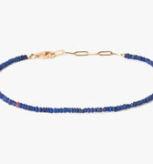 BEADED STONES LAPIS BRACELET 370: this 18k gold adjustable lapis stone bracelet is finished with a signature single ruby.