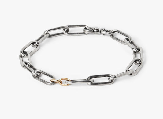 MIXED METAL STERLING SILVER/ 18K YELLOW GOLD BRACELET 377: this adjustable large paper clip chain bracelet is accented by a pair of 18k gold rings