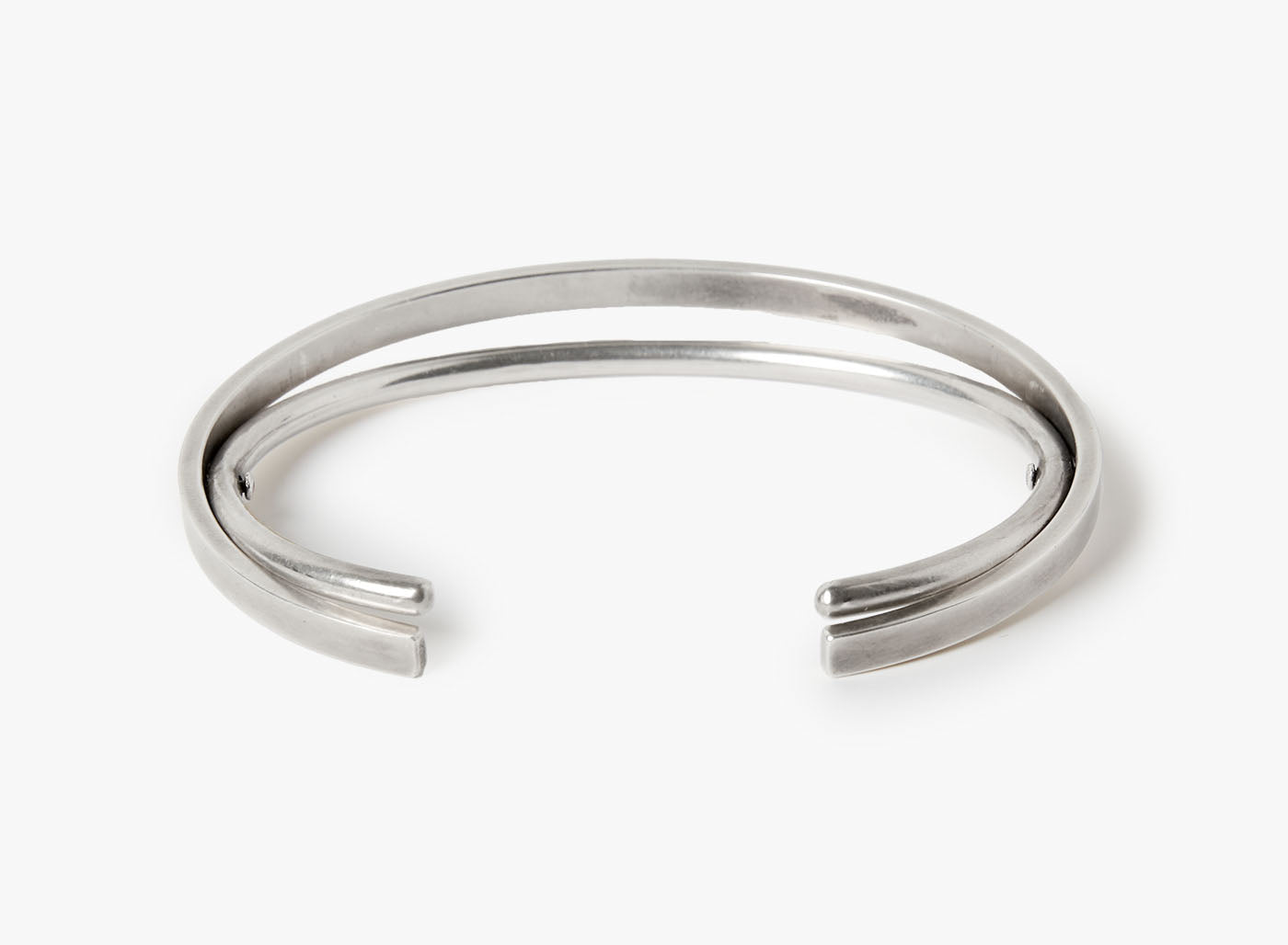 HINGED CUFF BRACELET 385: this dual pivoting cuff features two 8 gauge round wire cuffs that rotate on top of one another