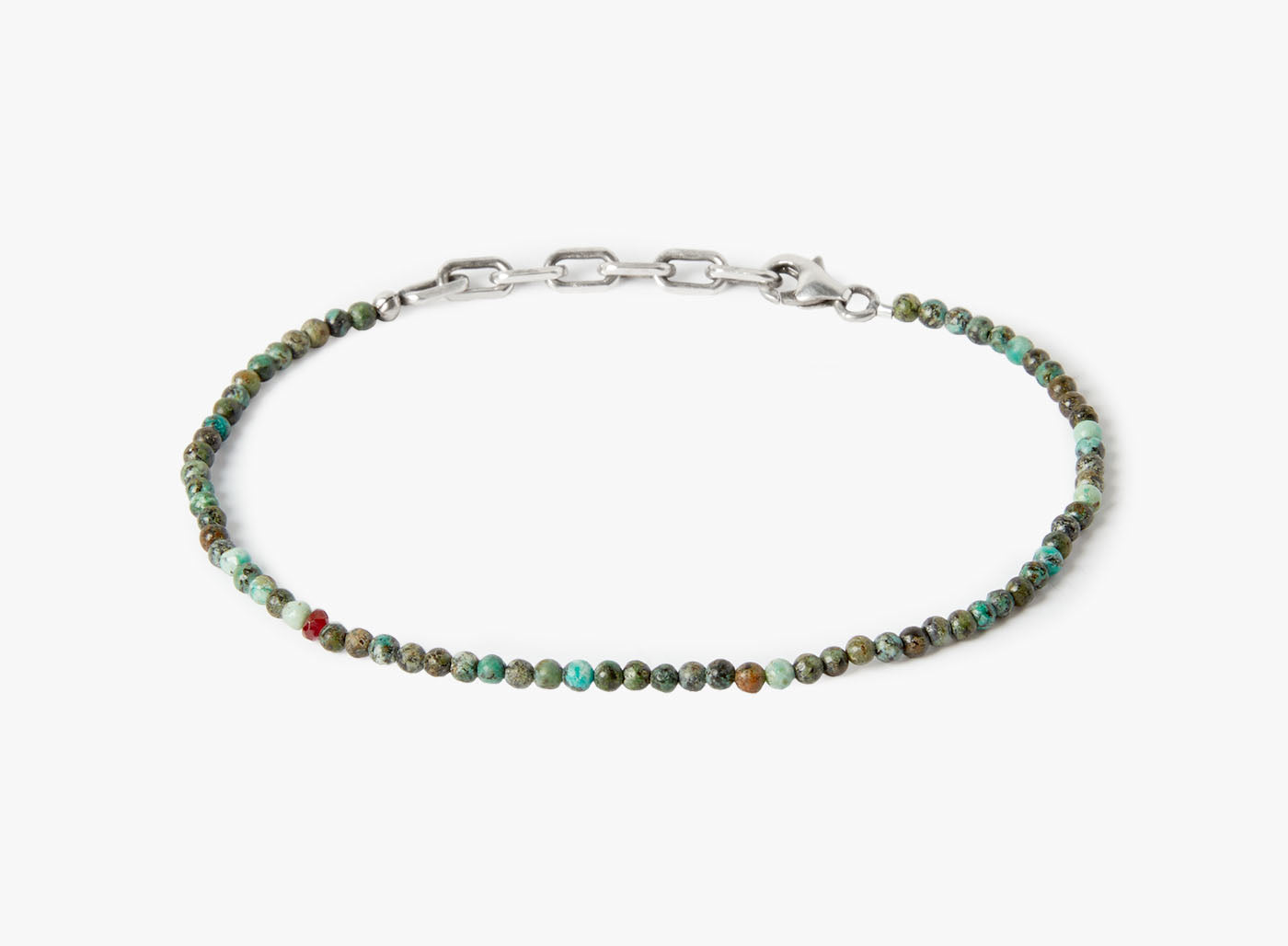 AFRICAN TURQUOISE BEADED STONES BRACELET 392: this adjustable african turquoise stone bracelet is finished with a signature single ruby