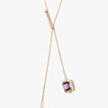 18k gold asymmetrical lariat necklace features pivoting emerald-cut smoky quartz (14x10mm) and amethyst (8x6mm) stones