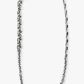 dense necklace features three varying sterling chains: a cable link, box link, and diamond beveled link