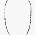 sterling necklace features an emerald cut iolite stone that sits along varying cable chains