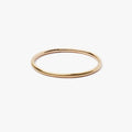 18K SOLID ROSE GOLD RING 013: this hand forged 18k gold band is refined, discreet and modern.