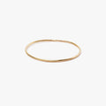 refined, modern & discreet, this 20 gauge 18k gold ring makes the perfect 'unity' band