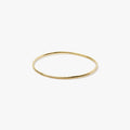 refined, modern & discreet, this 20 gauge 18k gold ring makes the perfect 'unity' band