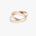 orbital ring is composed of two hinged 18k white gold and rose gold rings