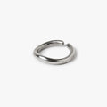 adjustable sterling open-ended ring is hand forged in our lower east side studio. it is made from reclaimed sterling silver, which is then oxidized - resulting in a darkened finish that will wear over time to a lighter, contrasting patina