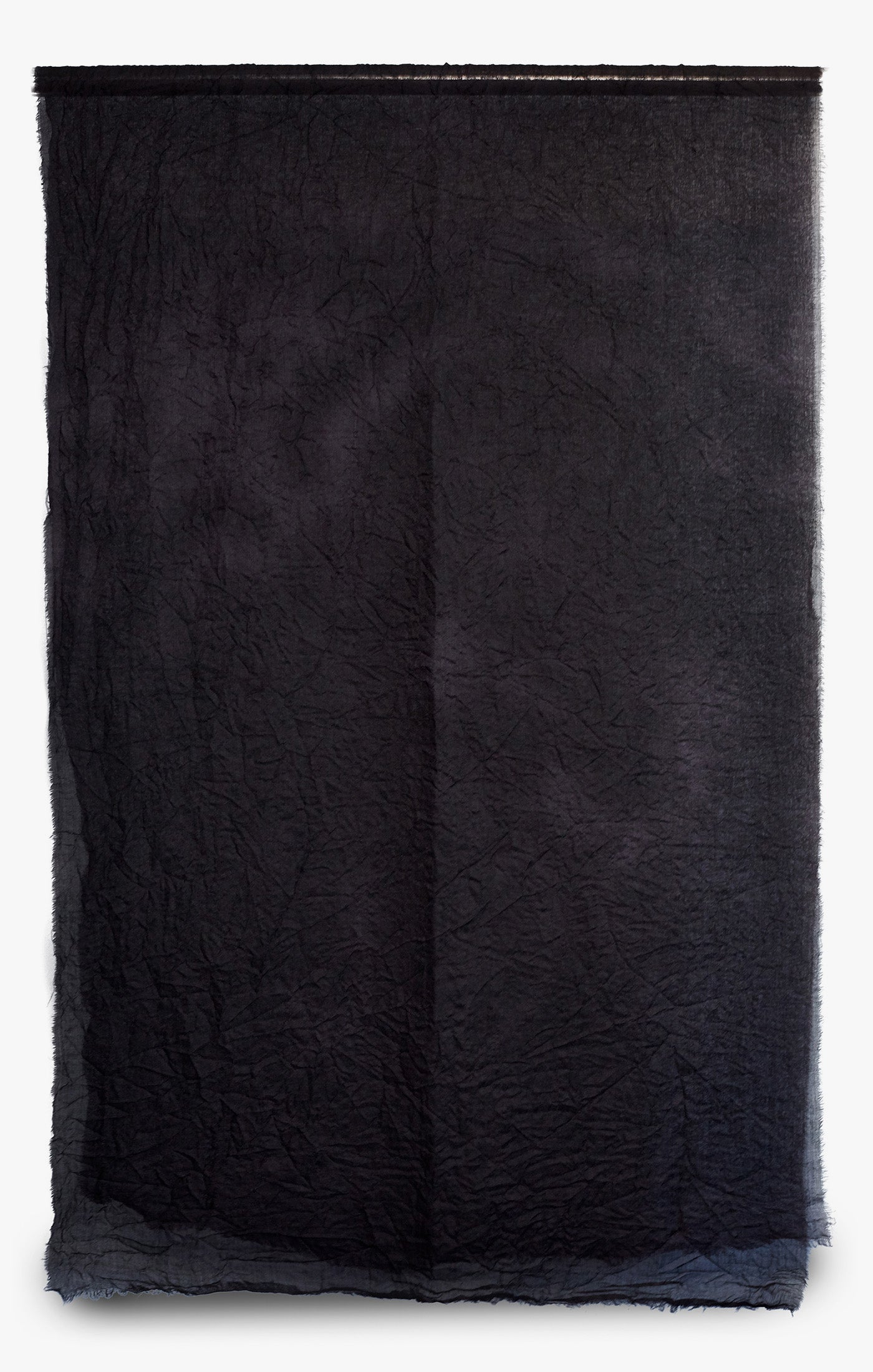 this hand-dyed tissue-weight scarf is made from mongolian cashmere, and finished with a raw edg