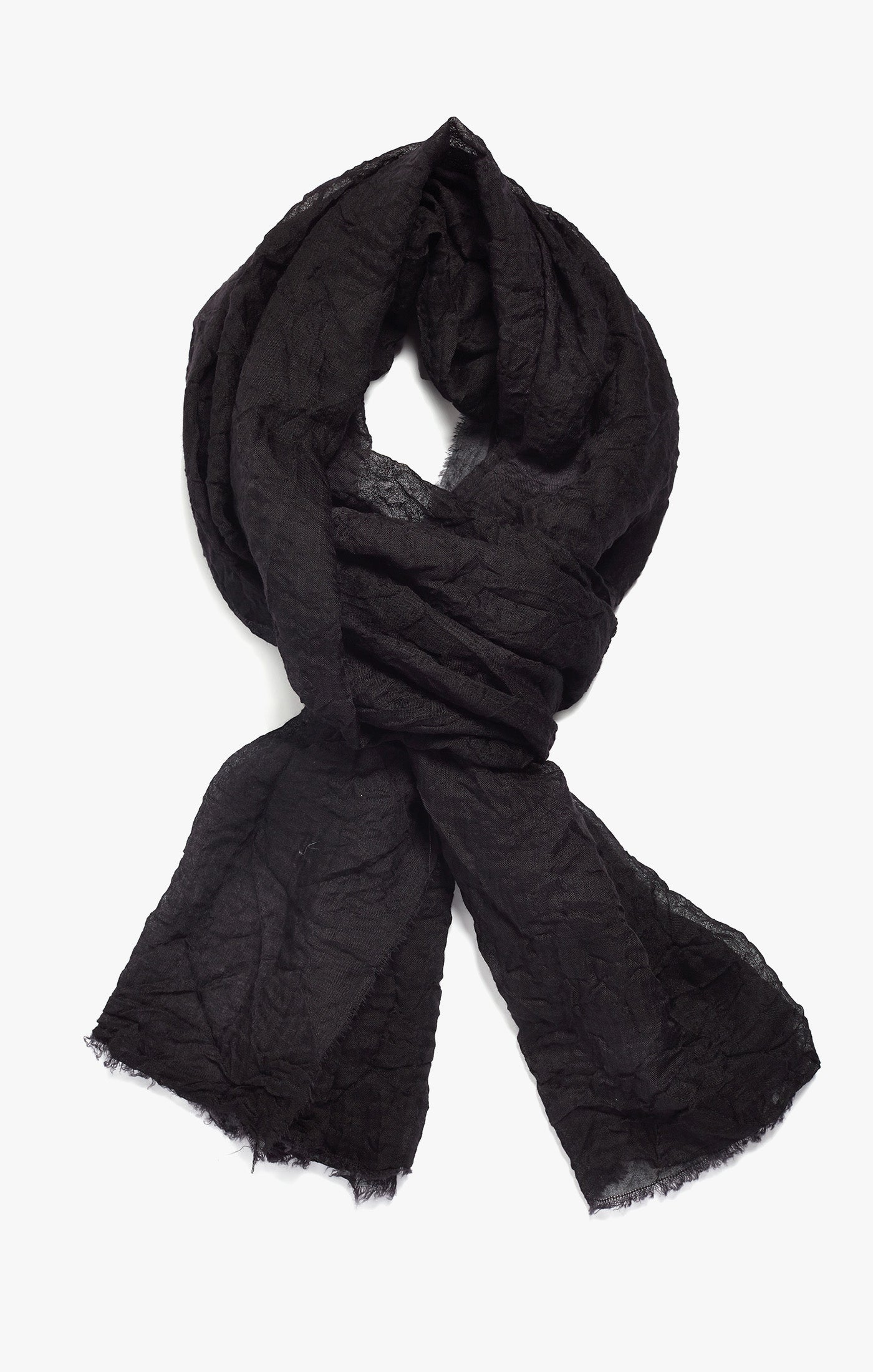 this hand-dyed tissue-weight scarf is made from mongolian cashmere, and finished with a raw edg