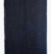 hand-dyed, tissue weight scarf is made from mongolian cashmere, and finished with a raw edge