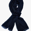 hand-dyed, tissue weight scarf is made from mongolian cashmere, and finished with a raw edge