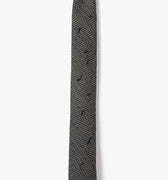 This image displays the ASYMMETRICAL COIL NECKTIE 1008, a stylish accessory crafted from imported Italian wool. The necktie features a sophisticated geometric pattern, adorned with asymmetrically hand-threaded coils in a subtle black and ivory color scheme.