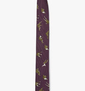 custom woven italian silk tie features silhouettes of falling men. it is finished with contrasting embroidered outlines