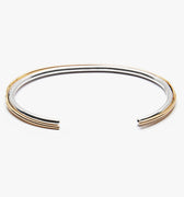 hinged cuff is made with 18k yellow gold &amp; sterling silver