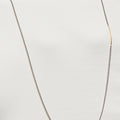 18k gold bar connects to a sterling bead chain, finished with a toggle clasp