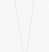 one inch solid 18k gold rod suspends from an ball chain disrupted by a solid bar