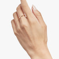 this 18k gold 16 gauge open ring is adjustable to fit a 4.5-7.5 finger.